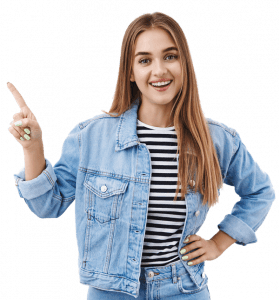 A woman in striped shirt and jean jacket pointing to the side.