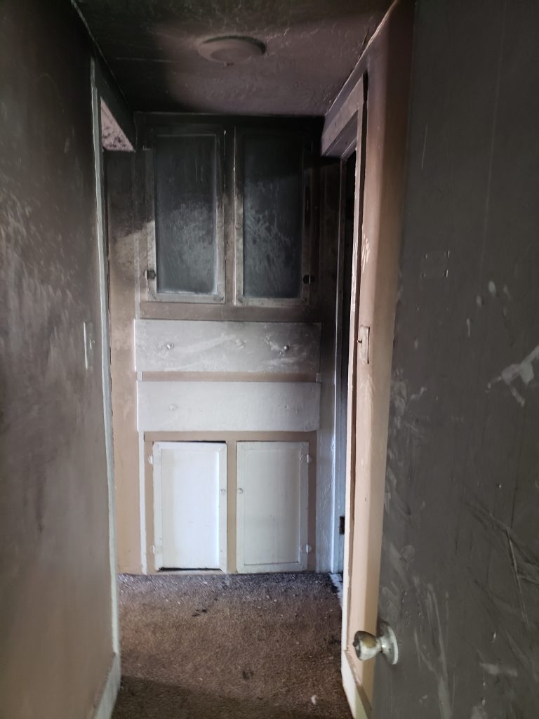 A door way leading to the bathroom.
