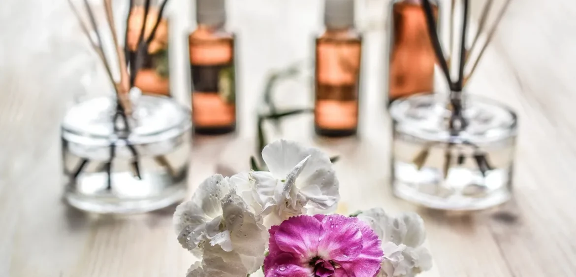 A close up of some flowers and bottles